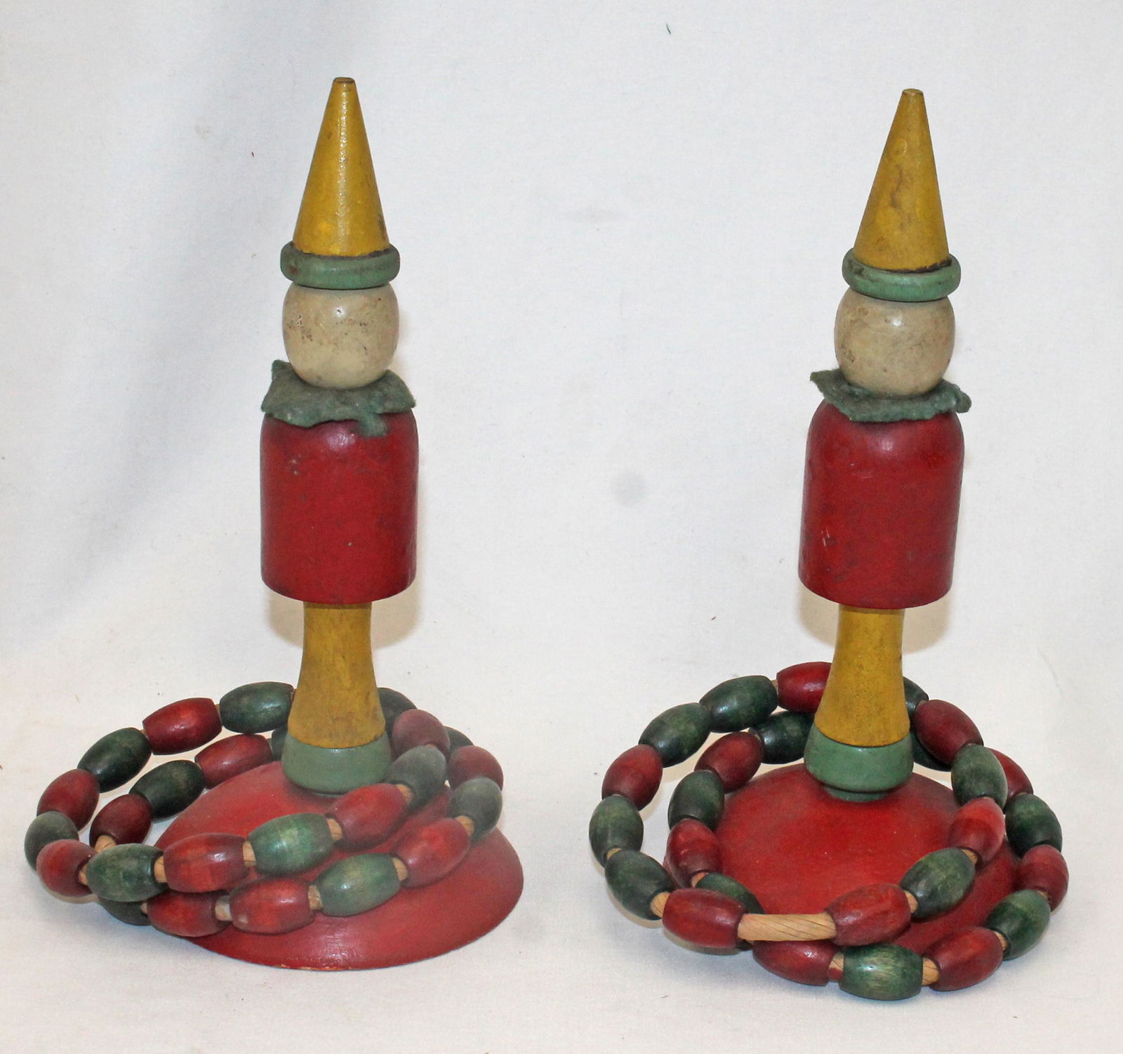 pr of early 20thC wooden painted figural ring toss game - 9 1/2" tall w 5" diam rings (1 of 6)