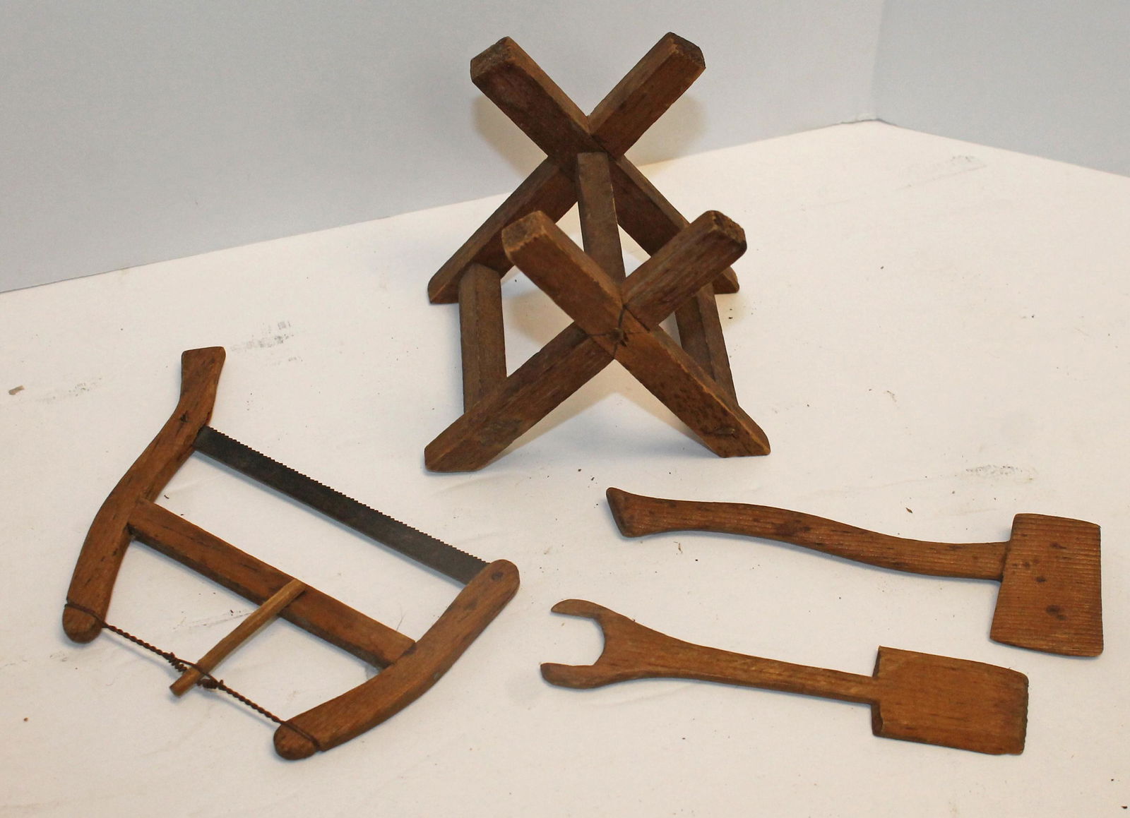 Doll size wooden tool lot incl saw horse, ax & saw (1 of 4)
