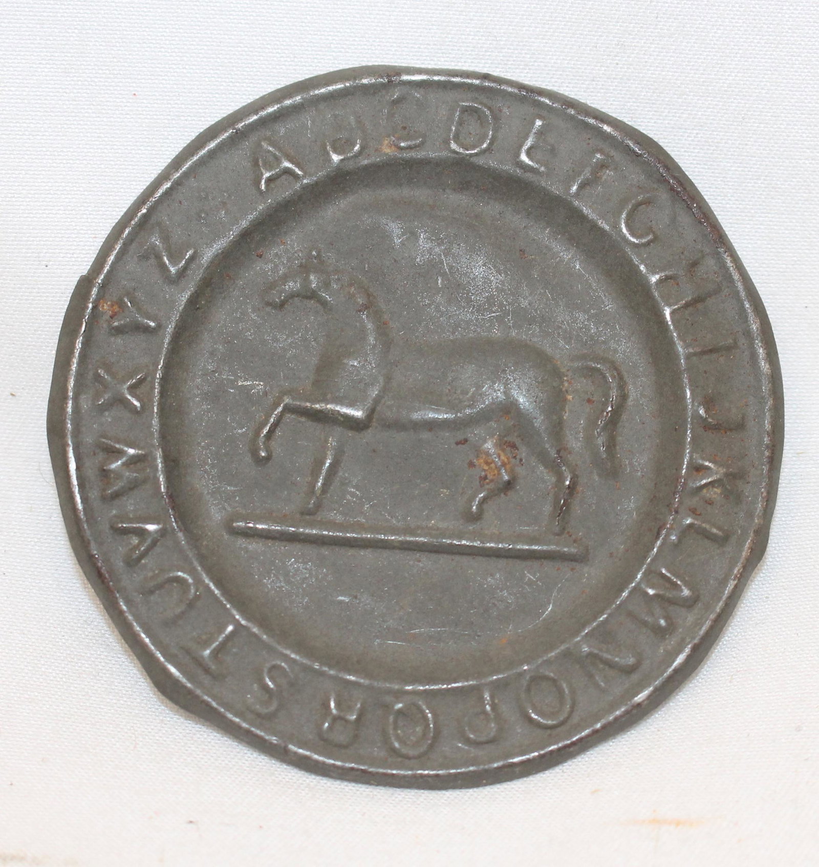 Antique doll size pewter ABC charger - 2" diam: Antique doll size pewter ABC charger - 2" diam