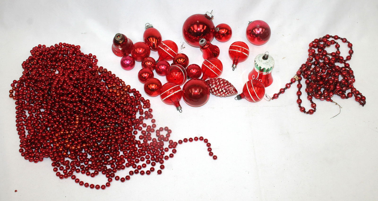 Lot of vintage/antique red glass Christmas ornaments plus red bead garlands: Lot of vintage/antique red glass Christmas ornaments plus red bead garlands