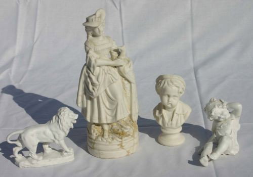 lot of 4 antique Parian sculptures some w imperfect: lot of 4 antique Parian sculptures some w imperfections incl children, a lion & a woman w pheasant