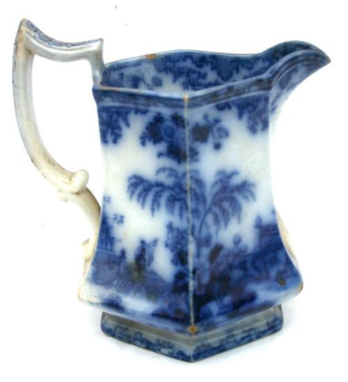 nice lot of Flow Blue "Scinde" pattern incl a 8" p: nice lot of Flow Blue "Scinde" pattern incl a 8" pitcher (spider at the bottom) & 8 scalloped border plates from 7 1/4" to 9 1/2"