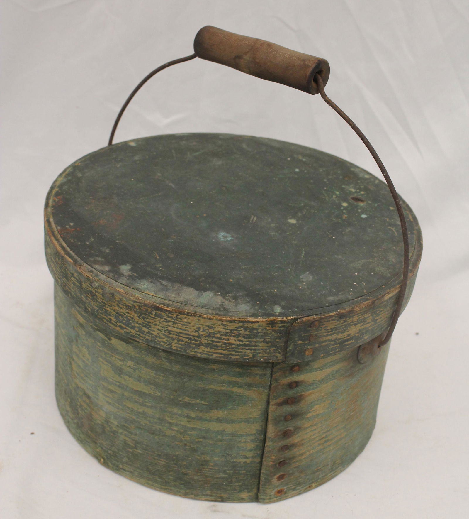 Antique pantry box in green paint w iron bail handle - 6" tall x 9 1/2" diam (1 of 5)