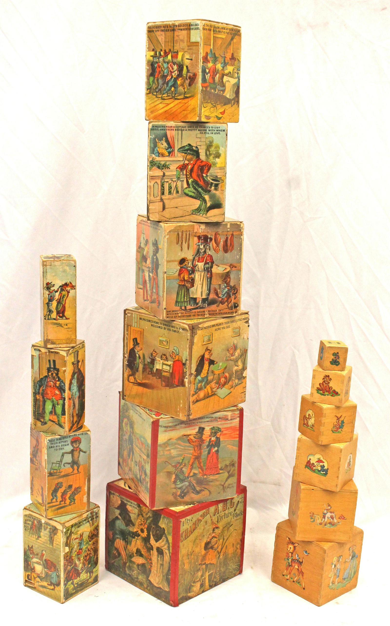 lot of 2 sets of graduated blocks - 1 w Nursery rhyme graphic lithograph dec - largest block is 7" (1 of 7)