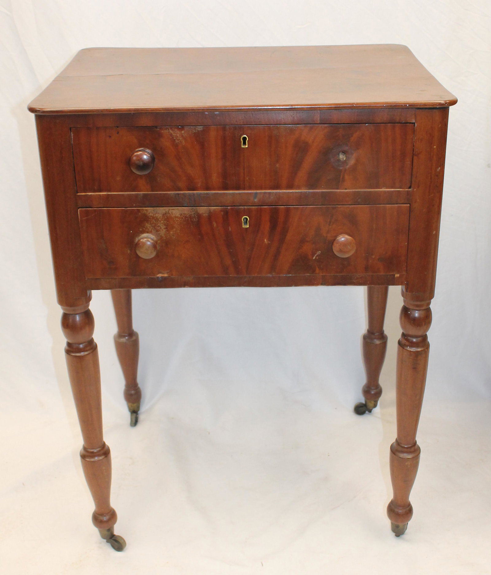 Antique 2 drawer night stand/ work table w turned legs on casters - 29" tall x 21 3/4" wide x 16" (1 of 5)