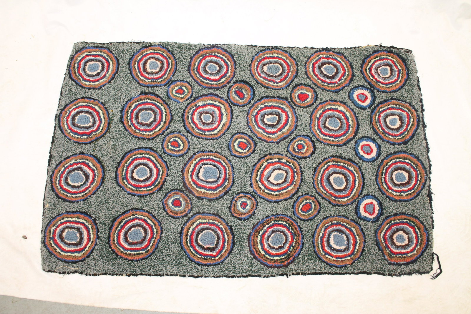 Hooked rug with allover multi-colored circles on gray background - 27"x44": Hooked rug with allover multi-colored circles on gray background - 27"x44"