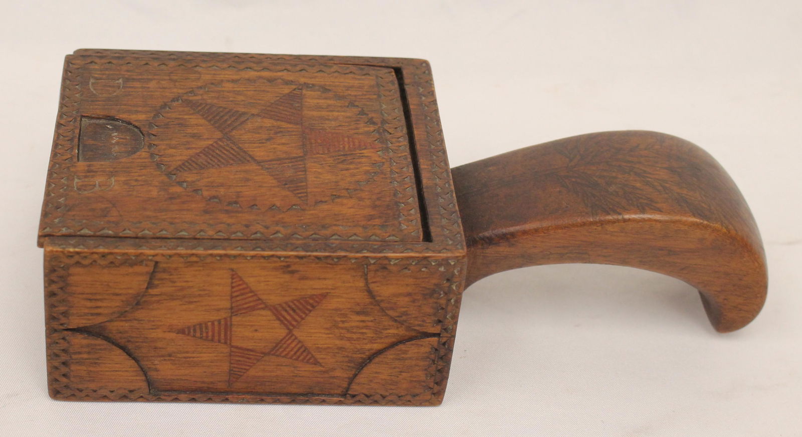 Wonderful carved slide top box w etched star dec & "DB" on top plus etched tree dec on curved handle (1 of 10)