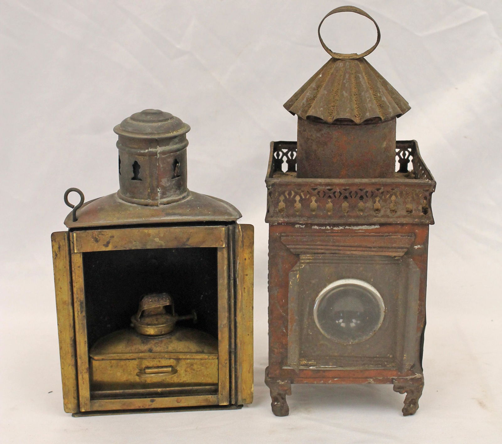 Lot of 2 antique lanterns - 1 tin 9 1/2" tall & the other brass 7 1/2" tall (1 of 9)