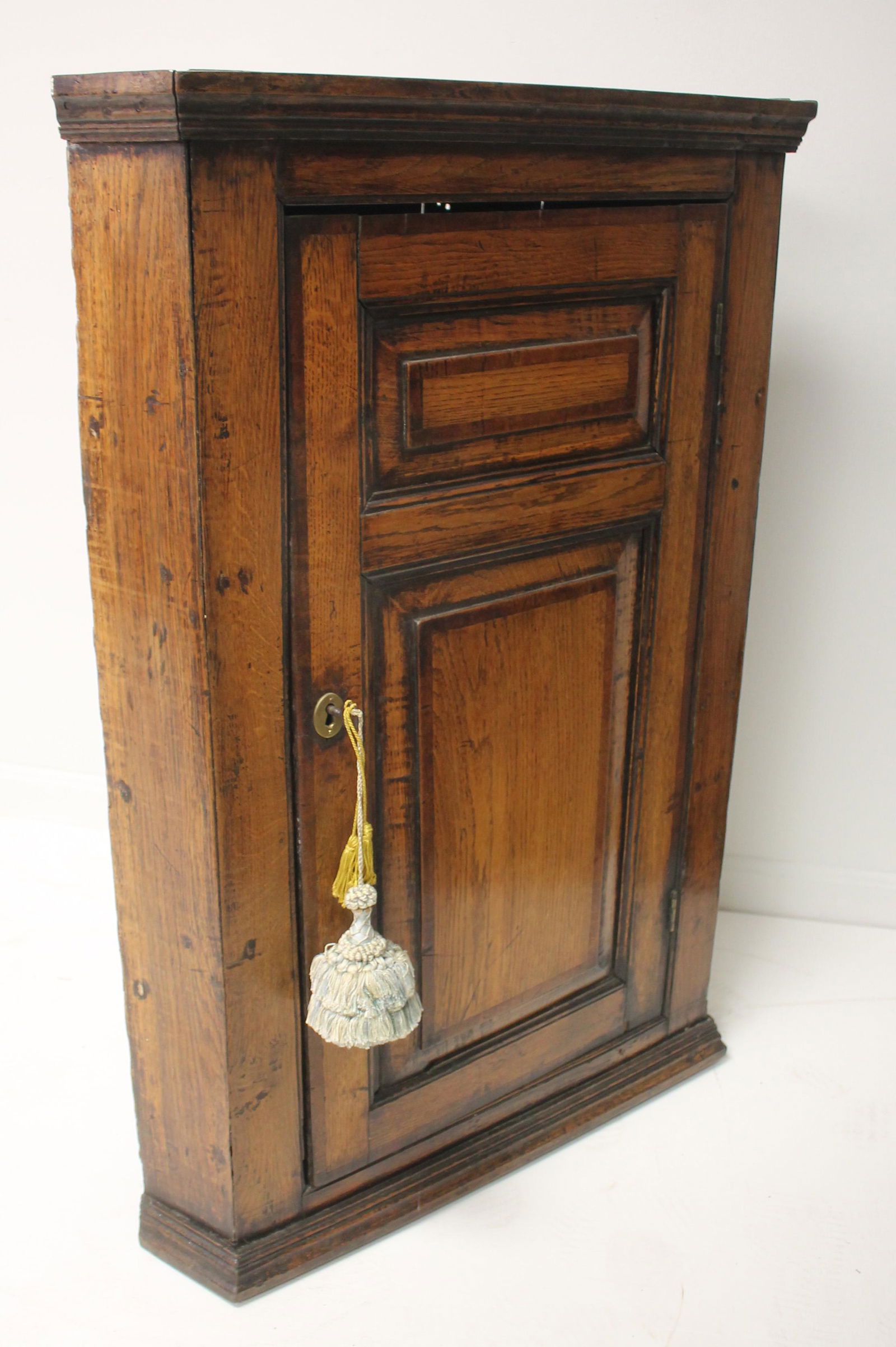 Antique oak hanging corner cupboard w paneled door - 38" tall x 26" wide x 16" deep (1 of 4)