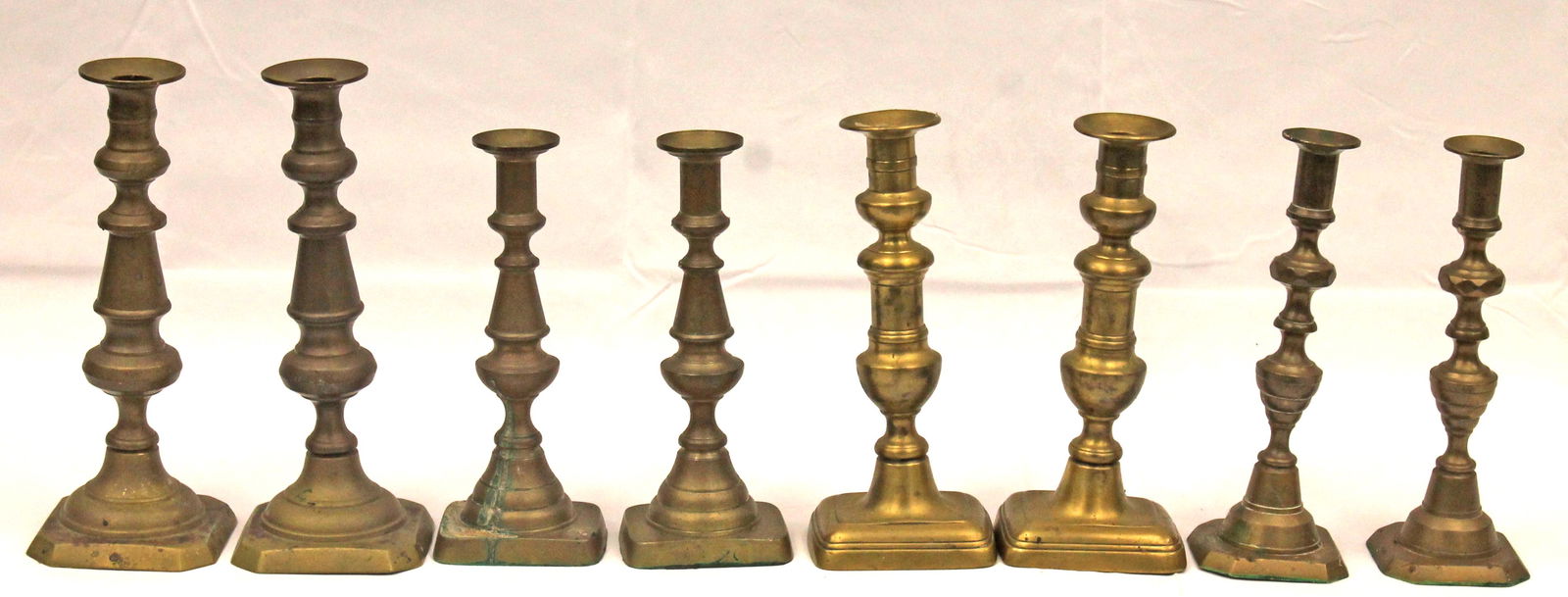 Group of 4 pairs of antique brass candlesticks (1 of 9)