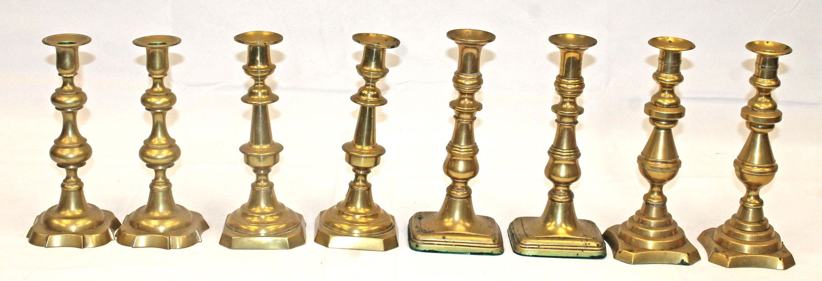 Group of 4 pairs of antique brass candlesticks - 9" & 10" tall (1 of 9)