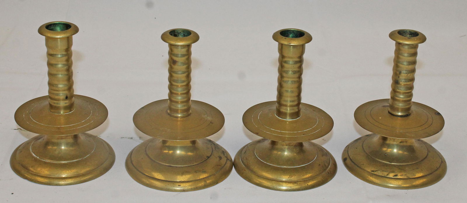 Lot of 4 antique brass capstan candlesticks - 5" tall (1 of 2)