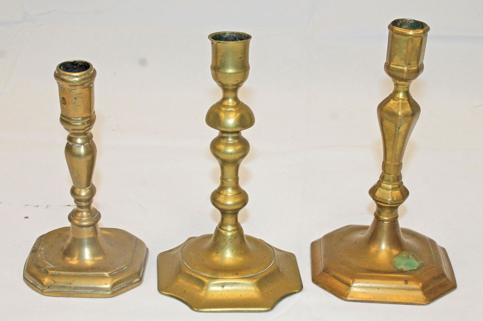 group of 3 antique brass candlesticks - 6"-7 1/2" tall (1 of 2)