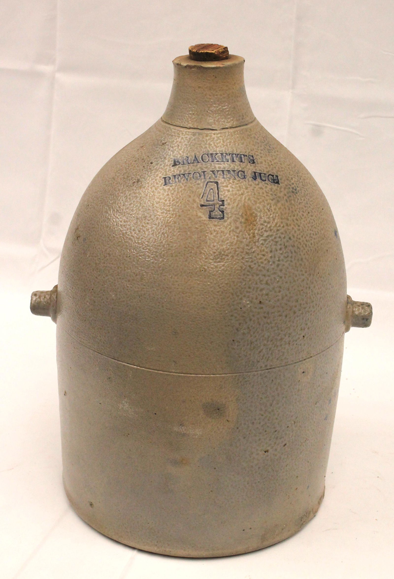 Lot of 2 stoneware jugs incl  4 gallon "Brackett's Revolving Jug" in cobalt on front - 18 1/2" & 9" (1 of 11)