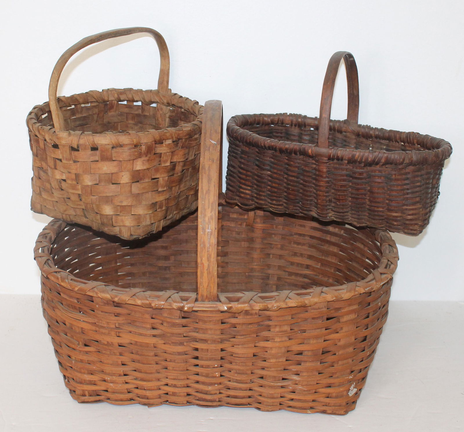 Lot of 3 fixed handled baskets - 9" to top of handle x 9 1/2" diam; 8 1/4" to top of handle x 12"x7" (1 of 9)