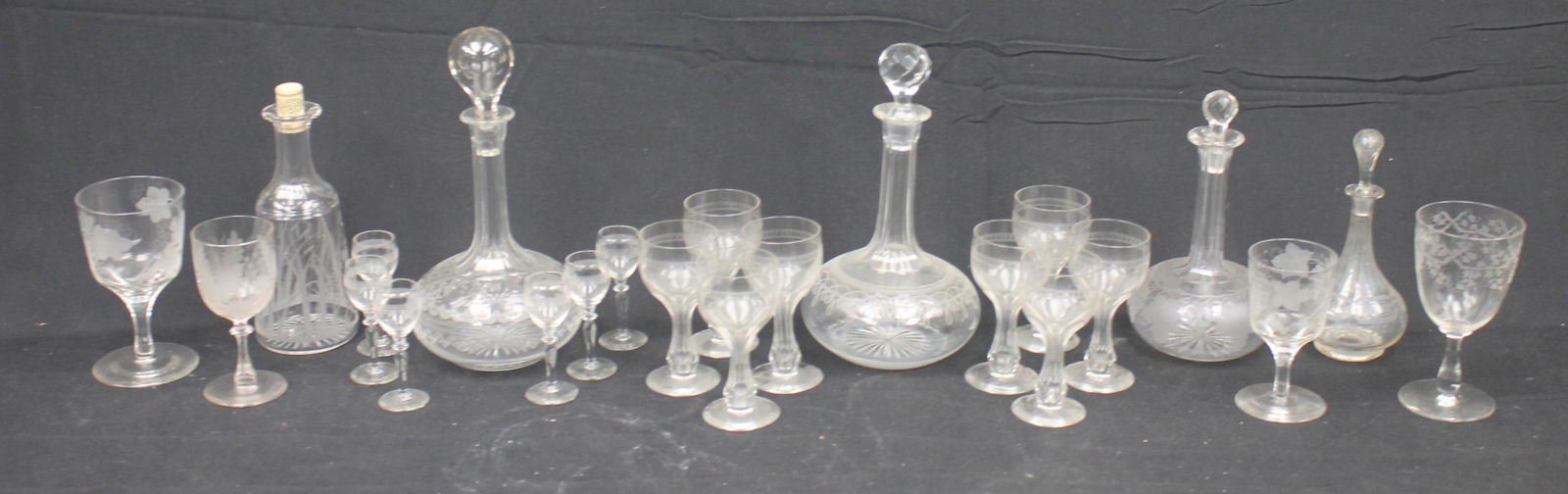 Lot of approx 23 pcs antique clear etched glass incl 5 decanters & sets of stemware in various sizes (1 of 5)