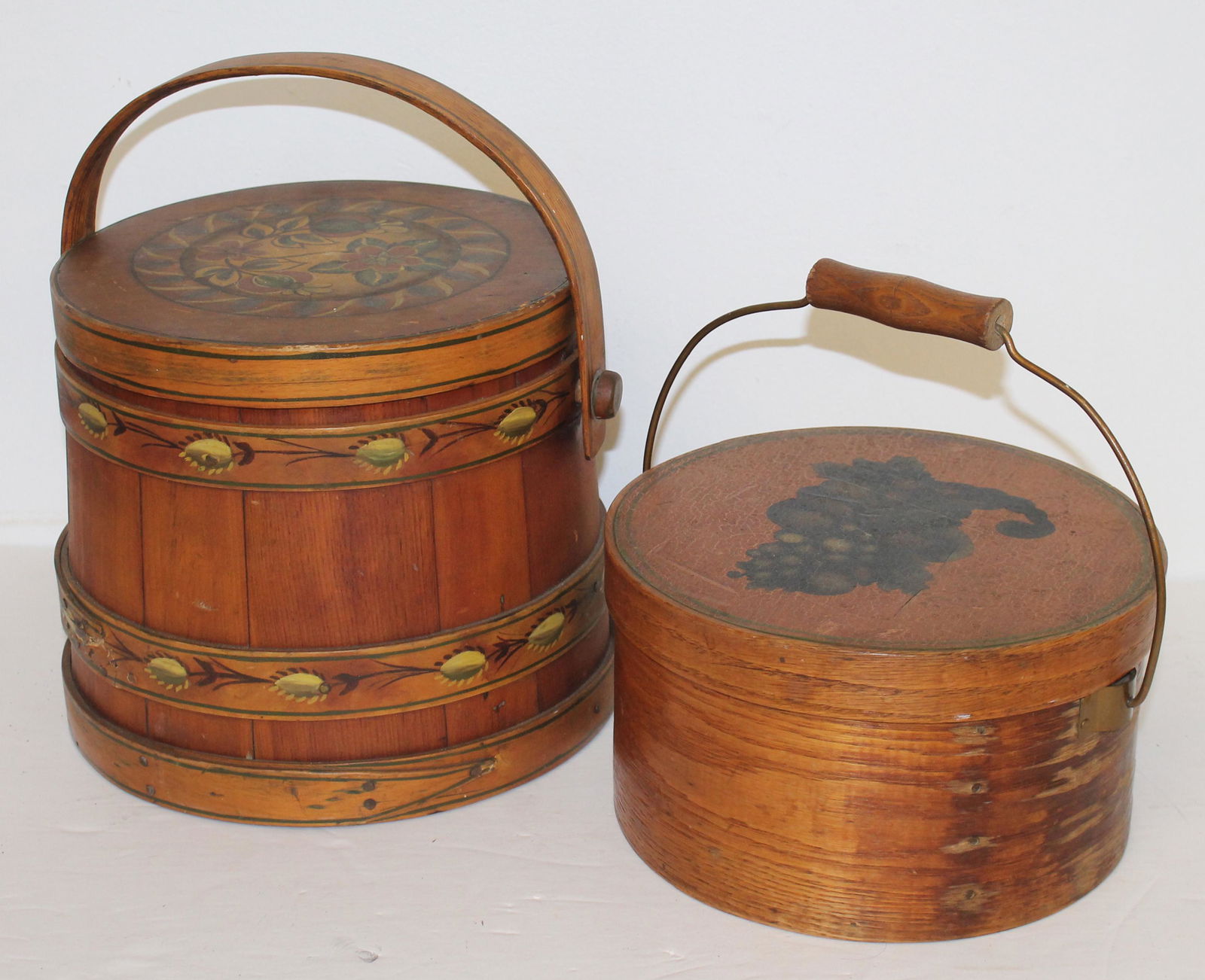 Lot of 2 treen items incl a decorated firkin 9 1/2" tall & a bail handled covered pantry box 9" diam (1 of 4)