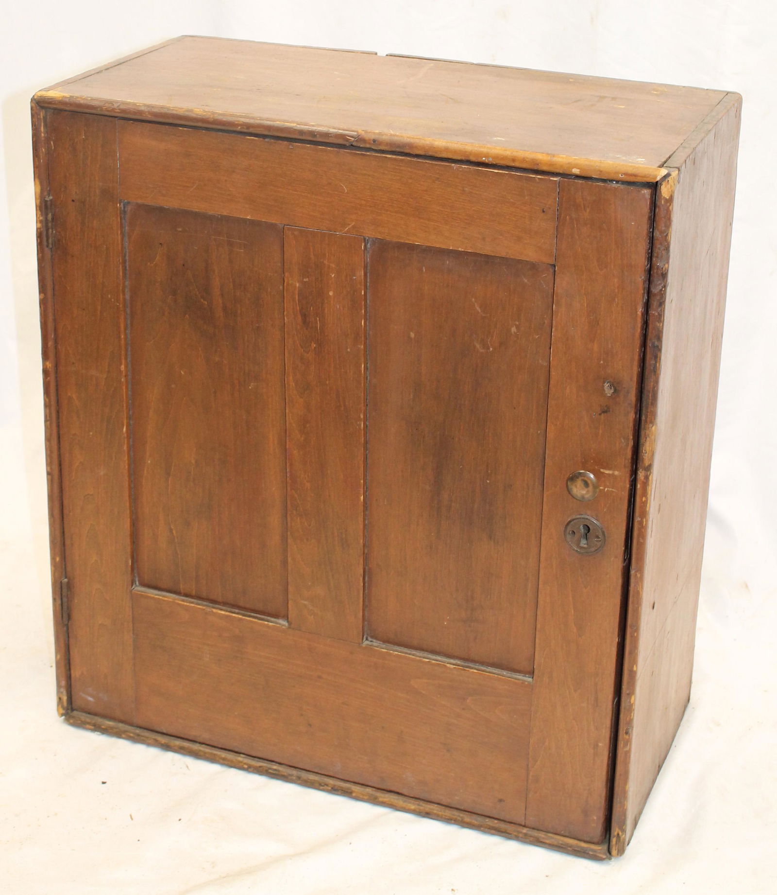 Antique 1 paneled door hanging cupboard in red paint w cubby interior - 24 1/2" tall x 21 1/2" wide (1 of 3)