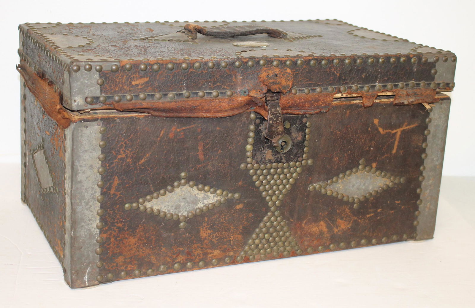 Antique leather bound traveling chest w brass tacks w brass tag inscribed "Sally Crosby Groton, NH" (1 of 7)