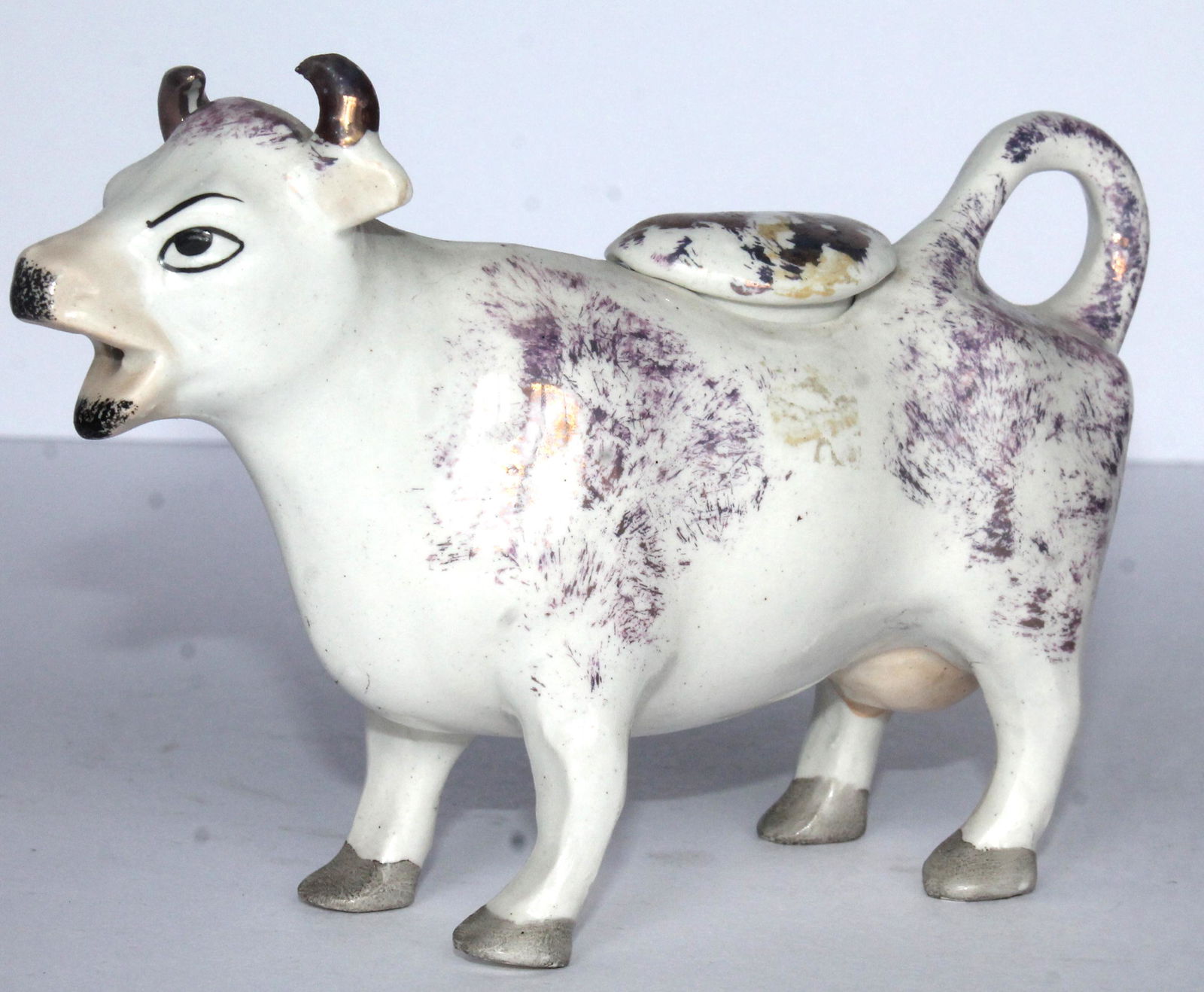 Antique Staffordshire cow creamer in pink lustre - 4" tall x 6 1/2" long: Antique Staffordshire cow creamer in pink lustre - 4" tall x 6 1/2" long