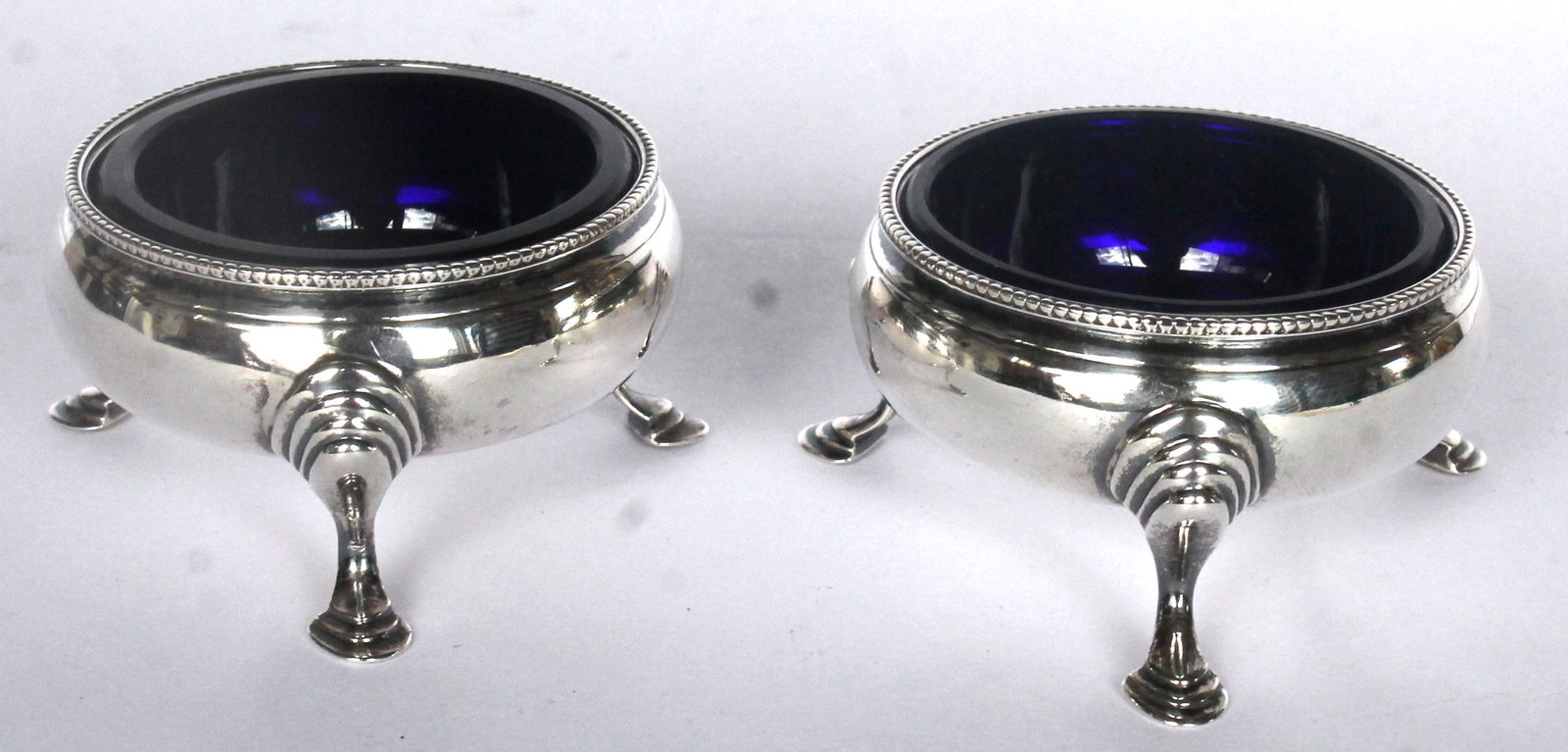 Pr of antique Hester Bateman sterling silver salts w cobalt liners - dated 1785 - 3" diam x 1 1/2" (1 of 5)