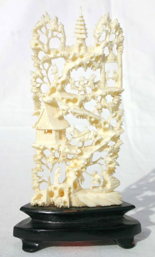Chinese intricate carved ivory village scene screen: Chinese intricate carved ivory village scene screen on wooden stand - height of ivory is 4" tall