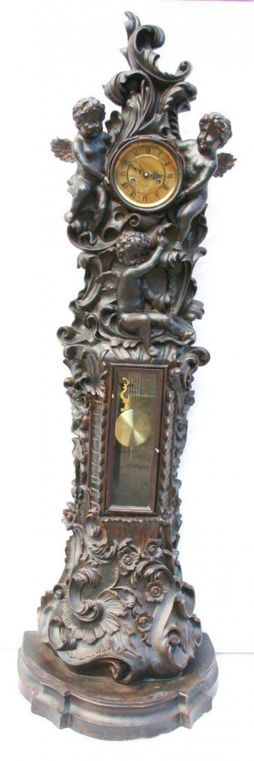 6'8" very ornate 20thC reproduction Black Forest s: 6'8" very ornate 20thC reproduction Black Forest style tall clock w multiple cherubs dec