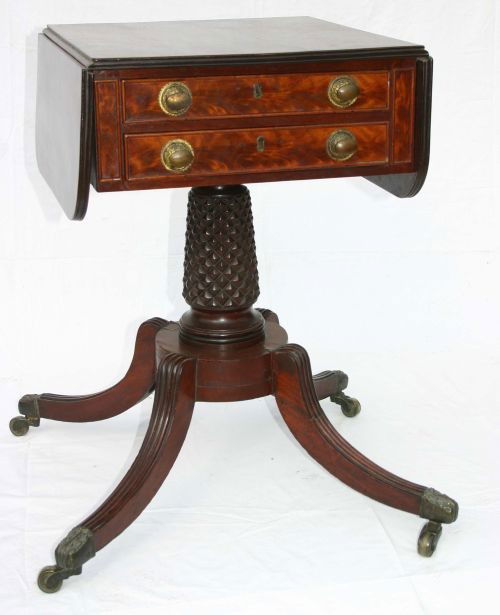 Great attrib Duncan Phyfe early 19thC 2 drawer dro: Great attrib Duncan Phyfe early 19thC 2 drawer dropleaf stand w pineapple carved pedestal & reeded legs ending in brass caster feet - 27" tall x 17 1/2" wide x 18" deep