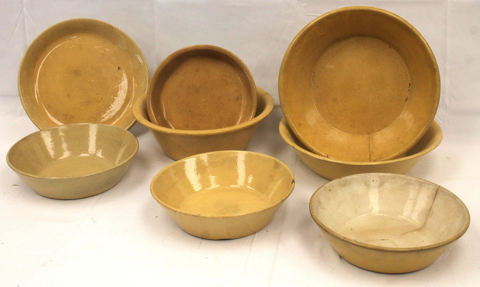 Lot of 7 yellowware milk pans - Matthew Mead collection: Lot of 7 yellowware milk pans - Matthew Mead collection