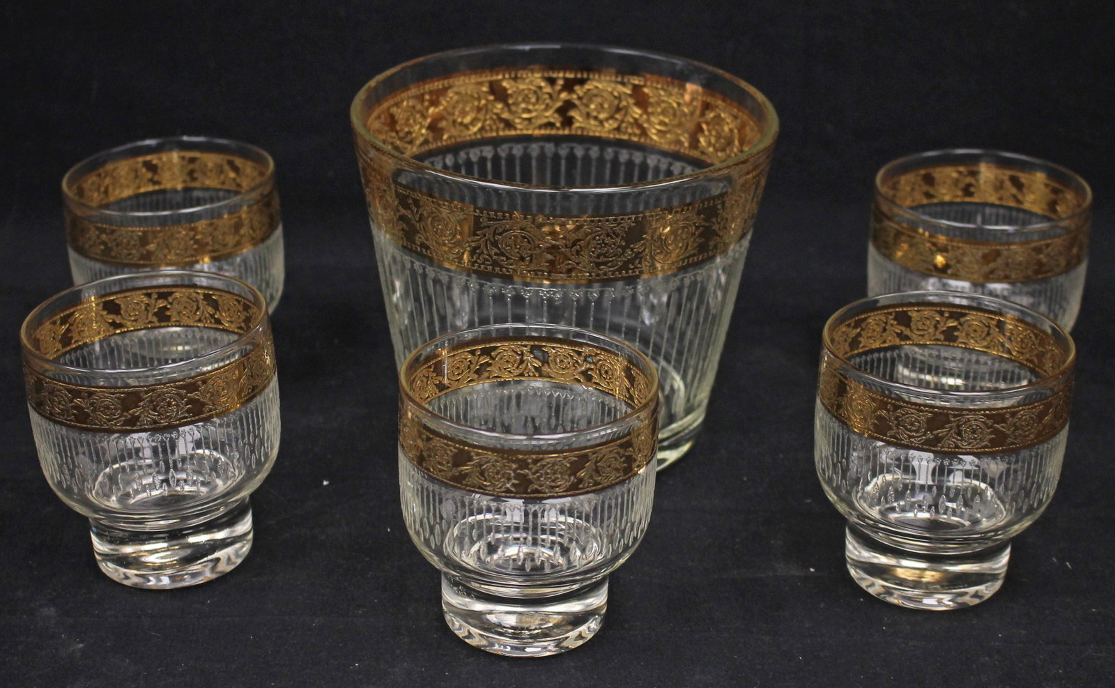 Vintage glass ice bucket & 5 glasses w etched glass & gold border dec - 5" x 6" diam bucket - This: Vintage glass ice bucket & 5 glasses w etched glass & gold border dec - 5" x 6" diam bucket - This lot was donated and proceeds from the sale of this lot will go to Brattleboro Area Hospice!