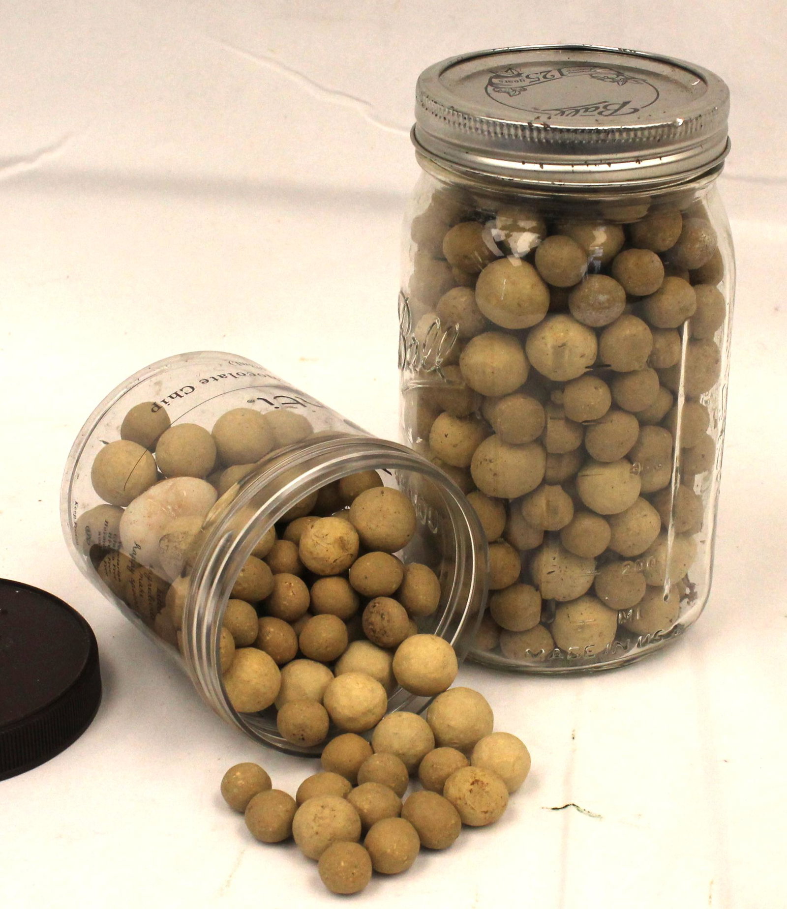 2 small jars of clay marbles - Matthew Mead collection: 2 small jars of clay marbles - Matthew Mead collection