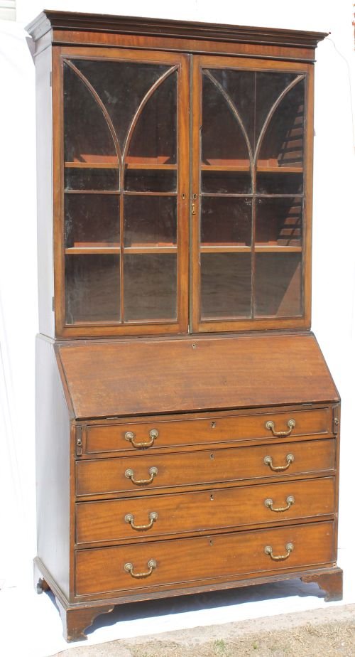 Period English ca 1790 slant front Cuban Mahogany: Period English ca 1790 slant front Cuban Mahogany secretary w 2 decoratively mullioned doors above a slant lid on 4 cockbeaded drawers w oak secindary wood - approx 86" tall