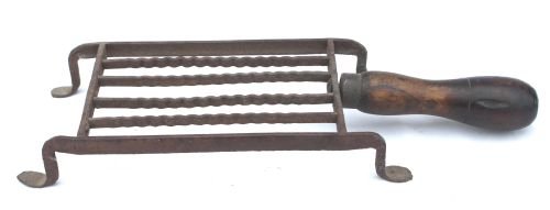antique small English iron wooden handled trivet: antique small English iron wooden handled trivet - 12 1/2" long