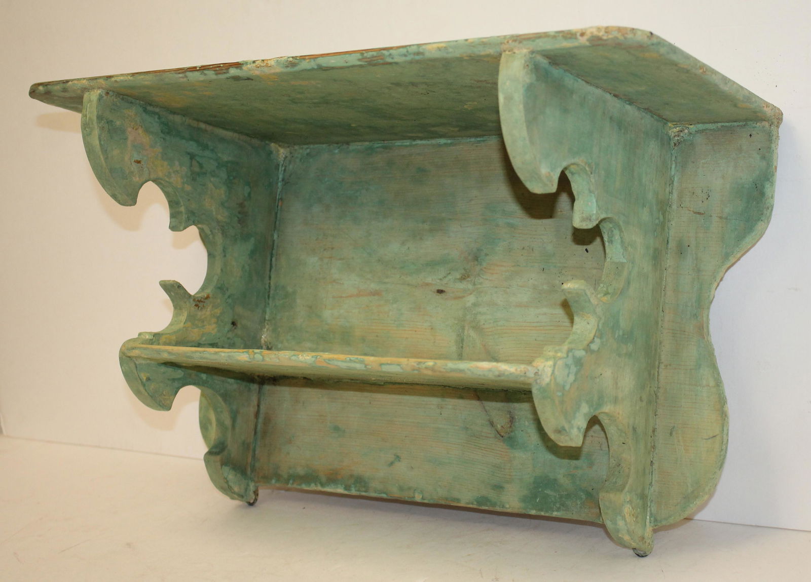 Carved wooden & painted green wall shelf w cut out sides - 11 1/2" tall x 19 1/4" wide x 8 1/4" deep (1 of 4)