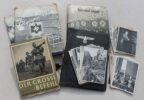 German Nazi ephemera lot incl "Olympia 1936 Vol I: German Nazi ephemera lot incl "Olympia 1936 Vol I & II", "Deutschland Erwacht" 1933, "Wehrdienft Ehrendienft" cpyrt Wilhelm Limpert Berlin (photo album), "Der Grosse Befehl" 1941 plus a collector's pa