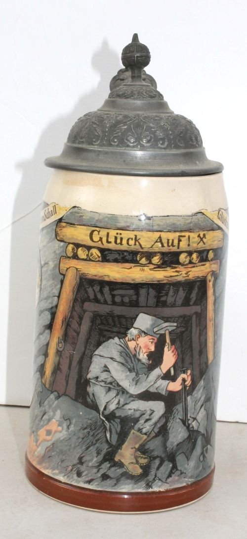 2 antique German 1/2L steins w pewter lids marked : 2 antique German 1/2L steins w pewter lids marked Geschutzt - one 8 1/2" w Mettlach #1909, the other 9 1/2" tall w relief dec