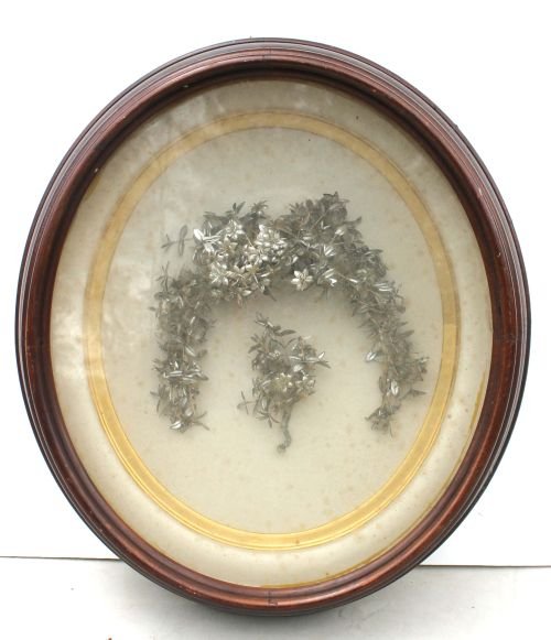 Victorian walnut oval deep shadow box frame w gilt: Victorian walnut oval deep shadow box frame w gilt liner displaying a Dresden foil type wedding ensemble - 17"x15"