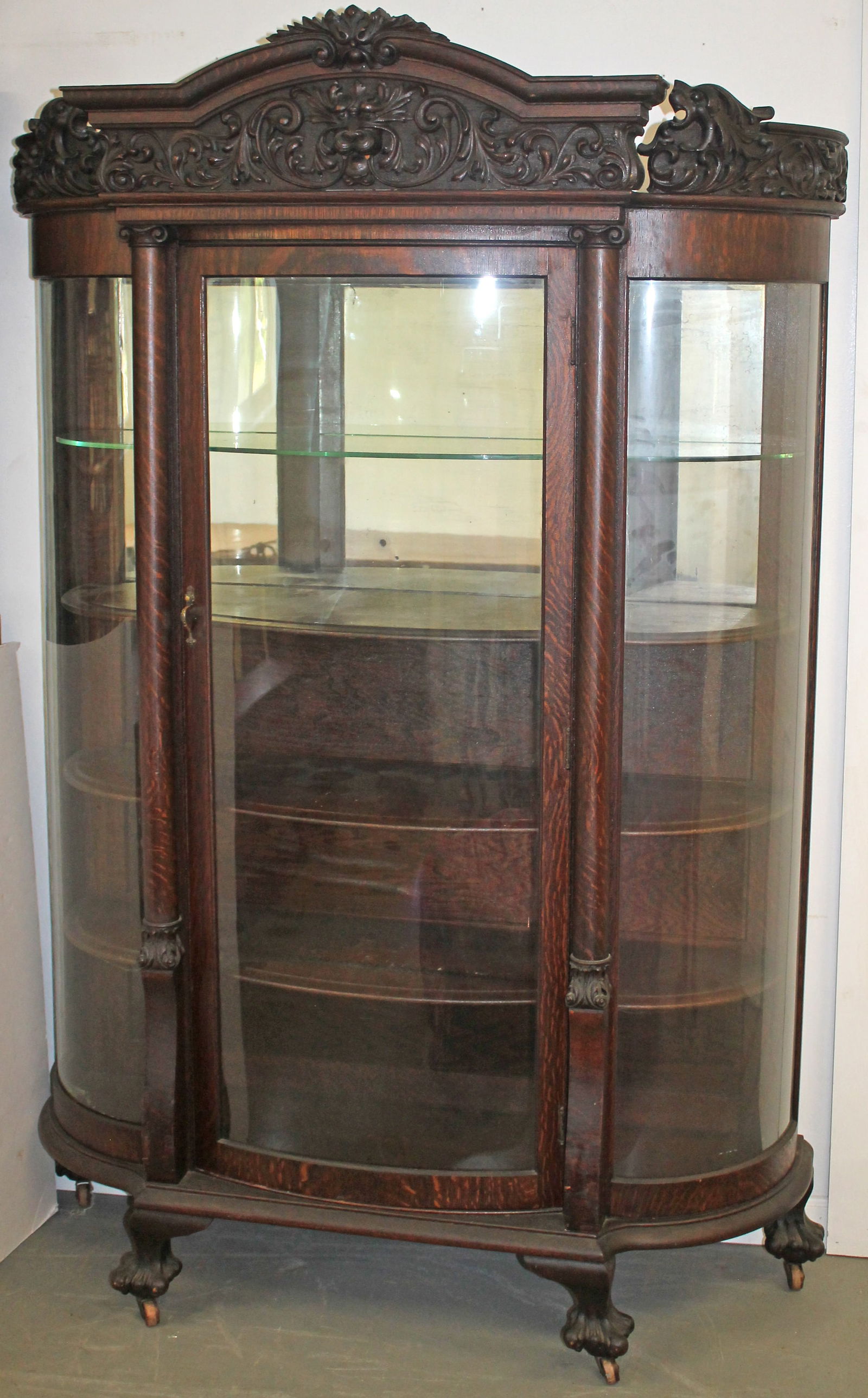 Victorian carved oak heavily carved china cabinet w 2 glass & 2 wooden shelves on paw feet & casters (1 of 7)