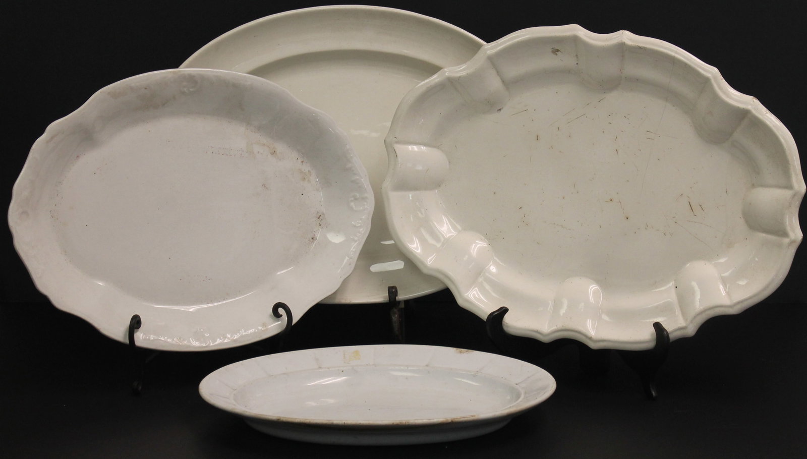 Lot of 4 white ironstone oval & oval scalloped platters -13 1/4", 15 3/4" & 18 1/4"(2): Lot of 4 white ironstone oval & oval scalloped platters -13 1/4", 15 3/4" & 18 1/4"(2)