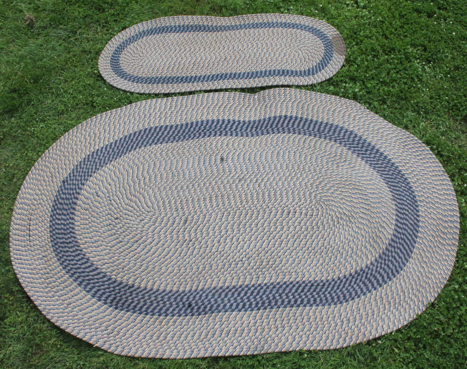 Oval rm size braided rug in blue & tan w a small closely matched oval braided runner (stain on one (1 of 5)