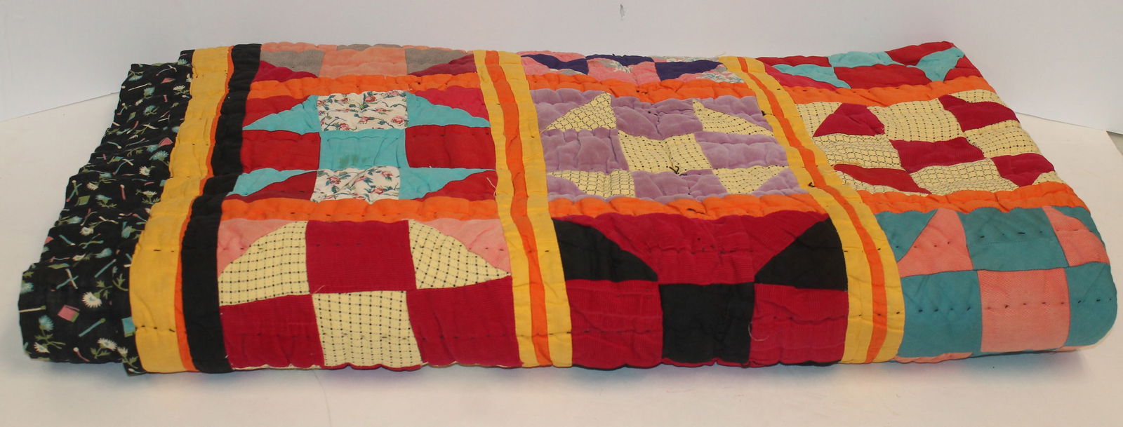 Antique cotton quilt made from multi color scraps - Oral history states attrib African American made (1 of 4)