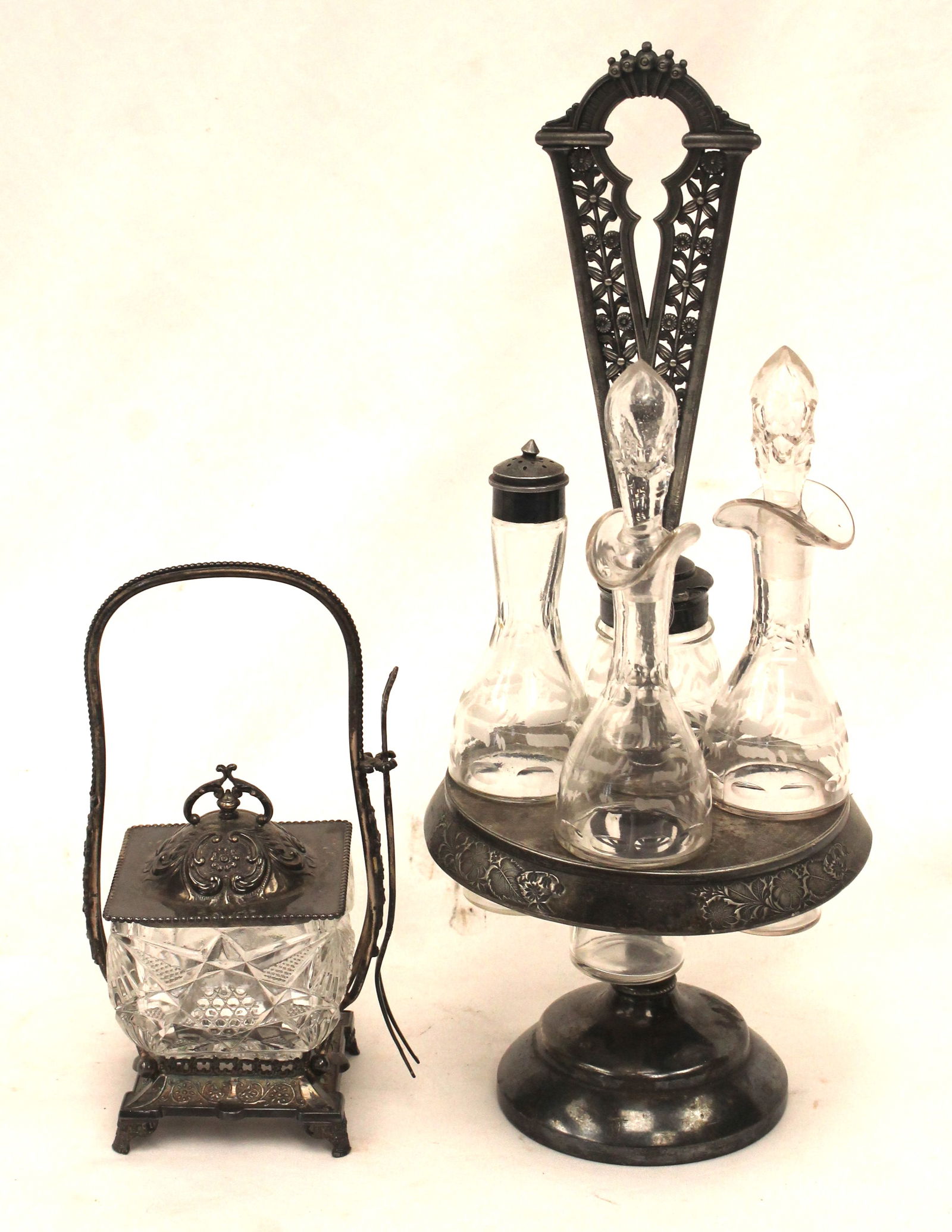 Victorian glass caster set in silver plate holder together w a Victorian pickle caster in silver (1 of 7)