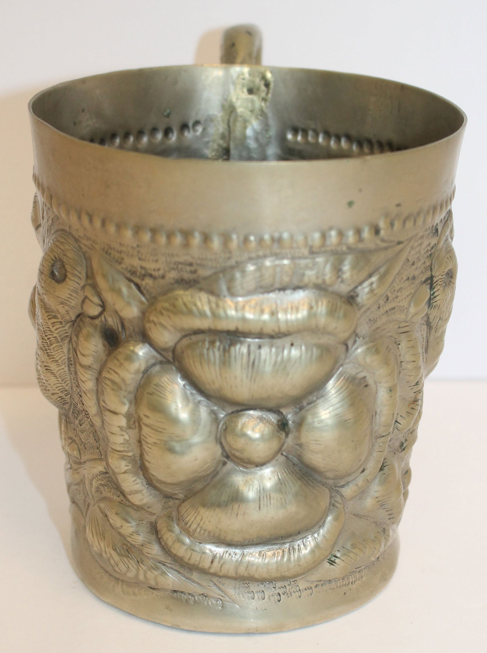 Interesting hammered silver mug w applied brass handle & blown out bird & floral decoration - (not: Interesting hammered silver mug w applied brass handle & blown out bird & floral decoration - (not silver hallmarked - could be plate) - 4 3/4" tall x 4" diam