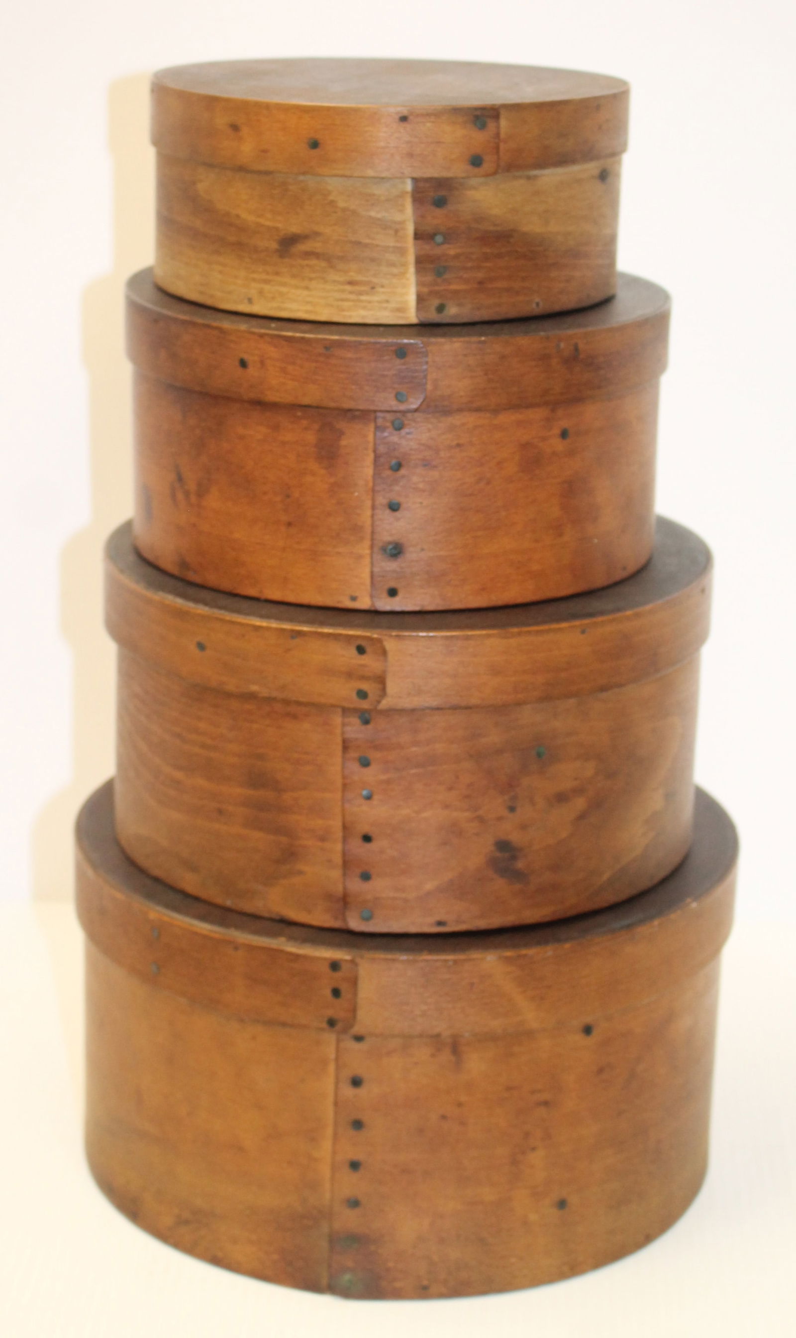 Stack of 4 antique round pantry boxes (1 of 9)