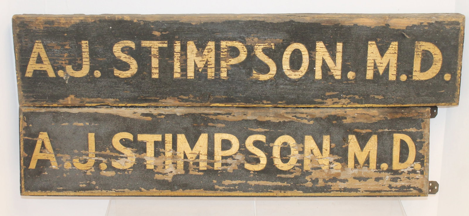 Carved wooden & painted 2 piece corner sign "A.J. Stimpson MD" - 5"x24" & 5" x 22 1/2": Carved wooden & painted 2 piece corner sign "A.J. Stimpson MD" - 5"x24" & 5" x 22 1/2"