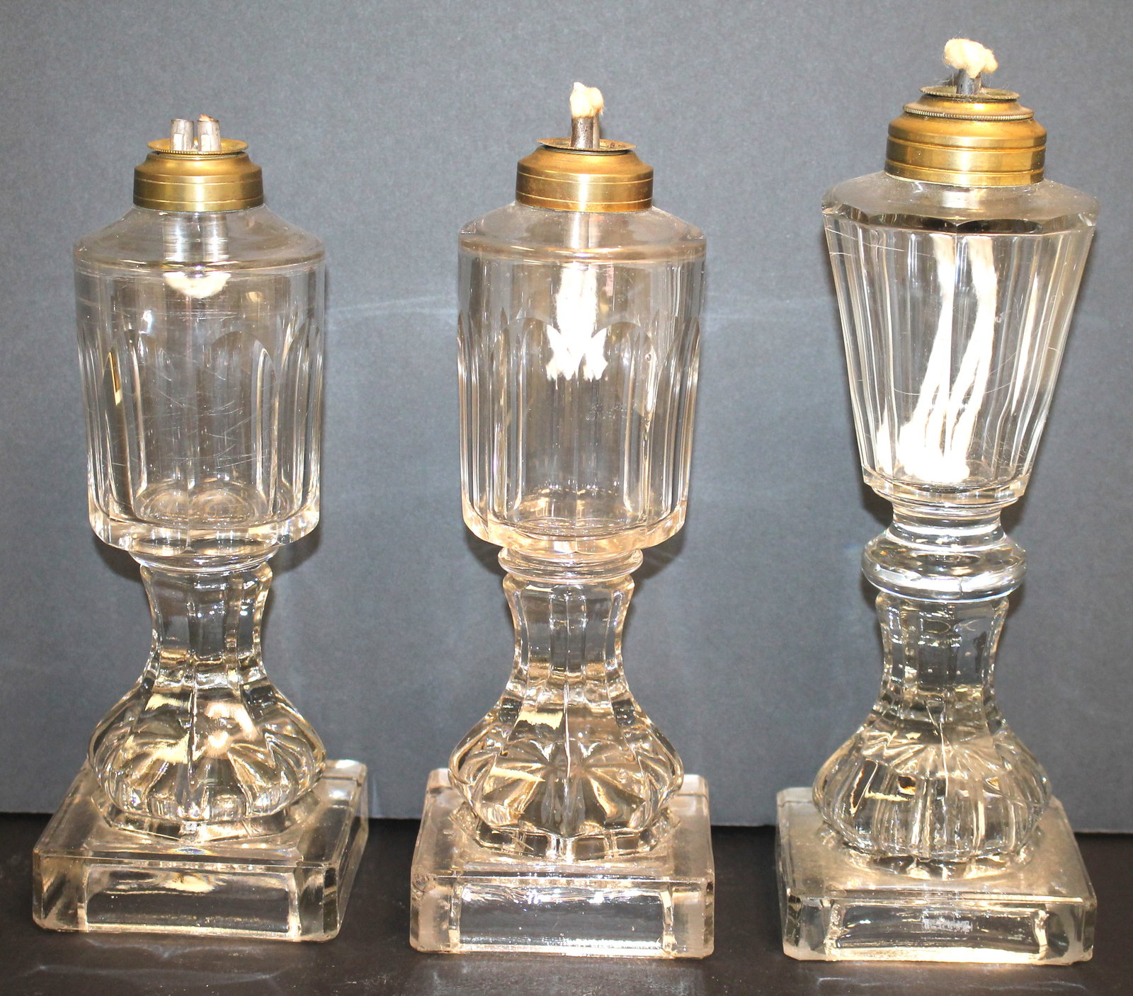 Lot of 3 antique flint glass whale oil lamps: Lot of 3 antique flint glass whale oil lamps