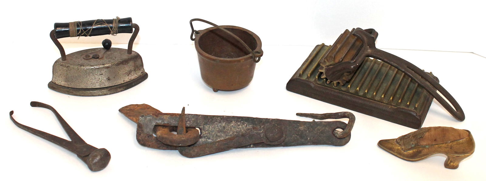 Lot of antique metal implements incl sad iron, mini iron kettle, iron latch, iron musket baller & (1 of 8)