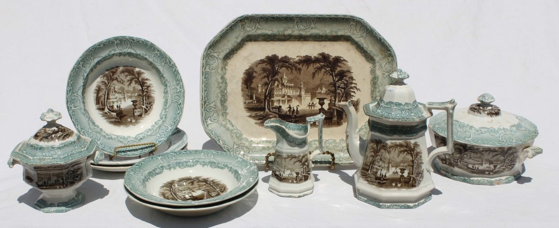 11 piece (mostly serving items) "Venus" pattern 19: 11 piece (mostly serving items) "Venus" pattern 19thC Pearl Stone Ware partial china service featuring green border w sepia centers