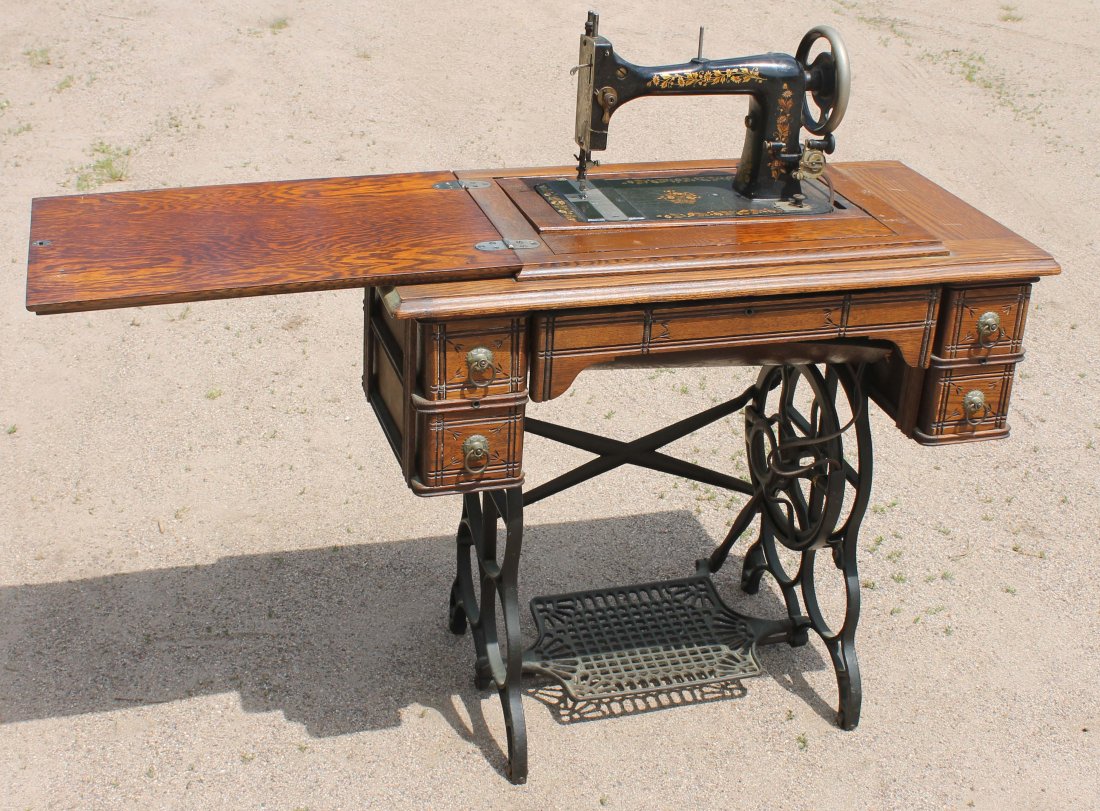 Victorian oak multi drawer sewing machine on cast: Victorian oak multi drawer sewing machine on cast iron base