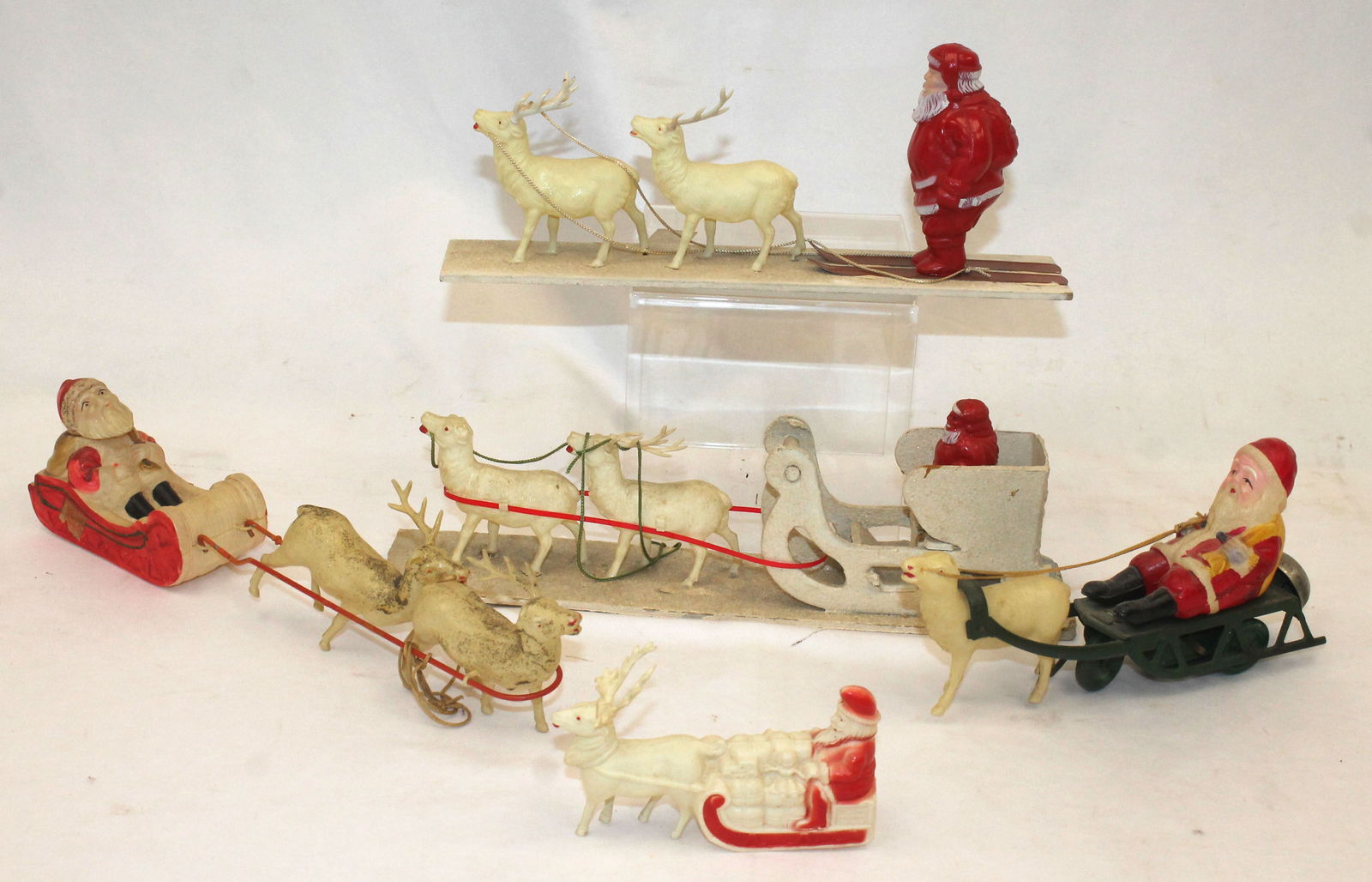 Lot of vintage plastic, celluloid & cardboard Santas, reindeer, sleds, etc (1 of 8)
